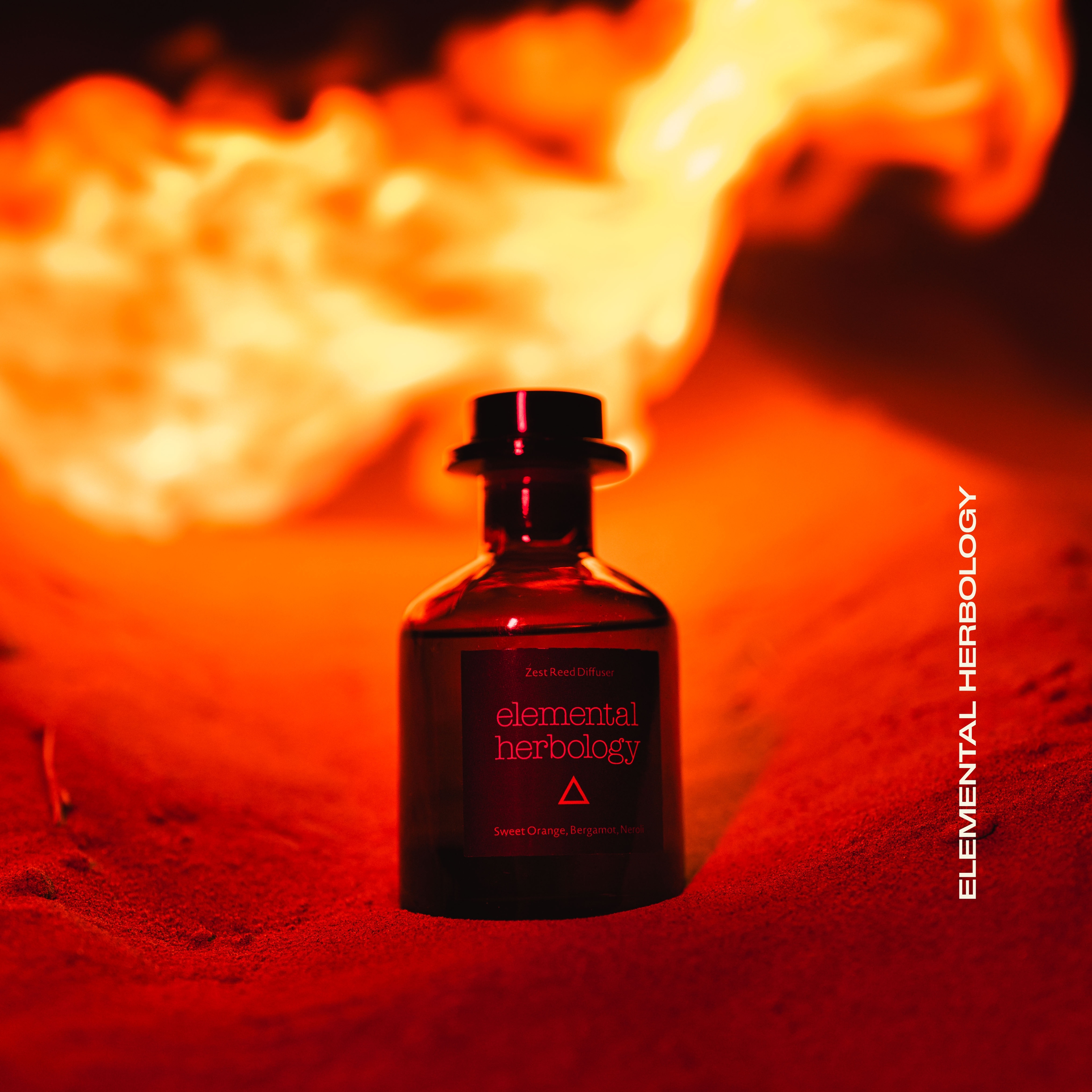 LUXURY SKIN CARE BRAND ELEMENTAL HERBOLOGY NATURAL INGREDIENTS PHOTOSHOOT OUTDOOR BEACH CREATIVE AGENCY MAYFAIR LONDON FIRE ELEMENT SURREAL PHOTOSHOOT UNITED KINGDOM CREATIVES